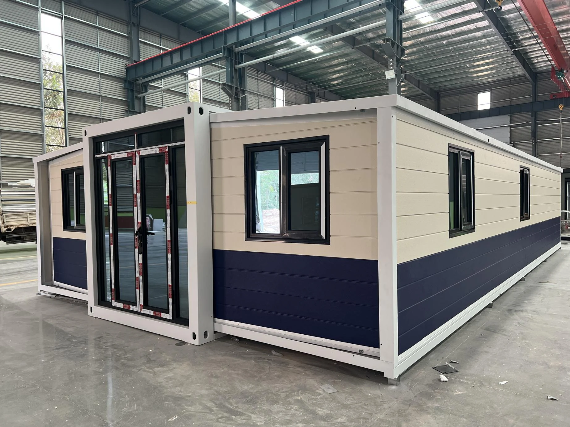 Expandable container house exterior for emergency shelter
