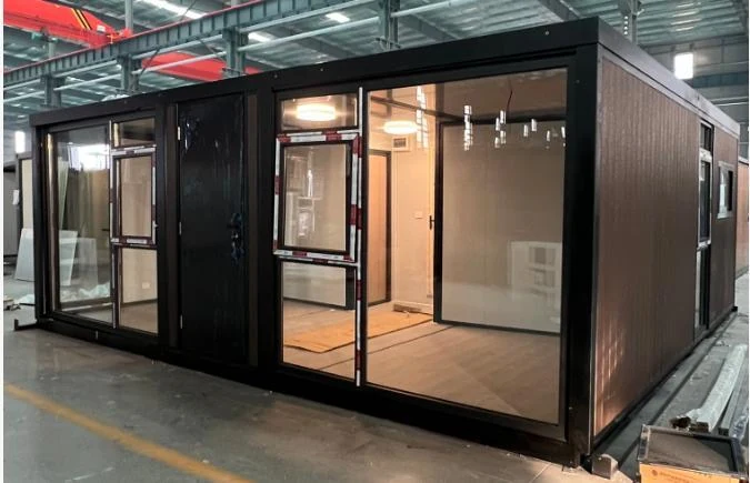 Glass front expandable container house for commercial space