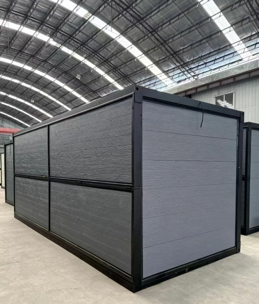Folding container house gray back side panel view
