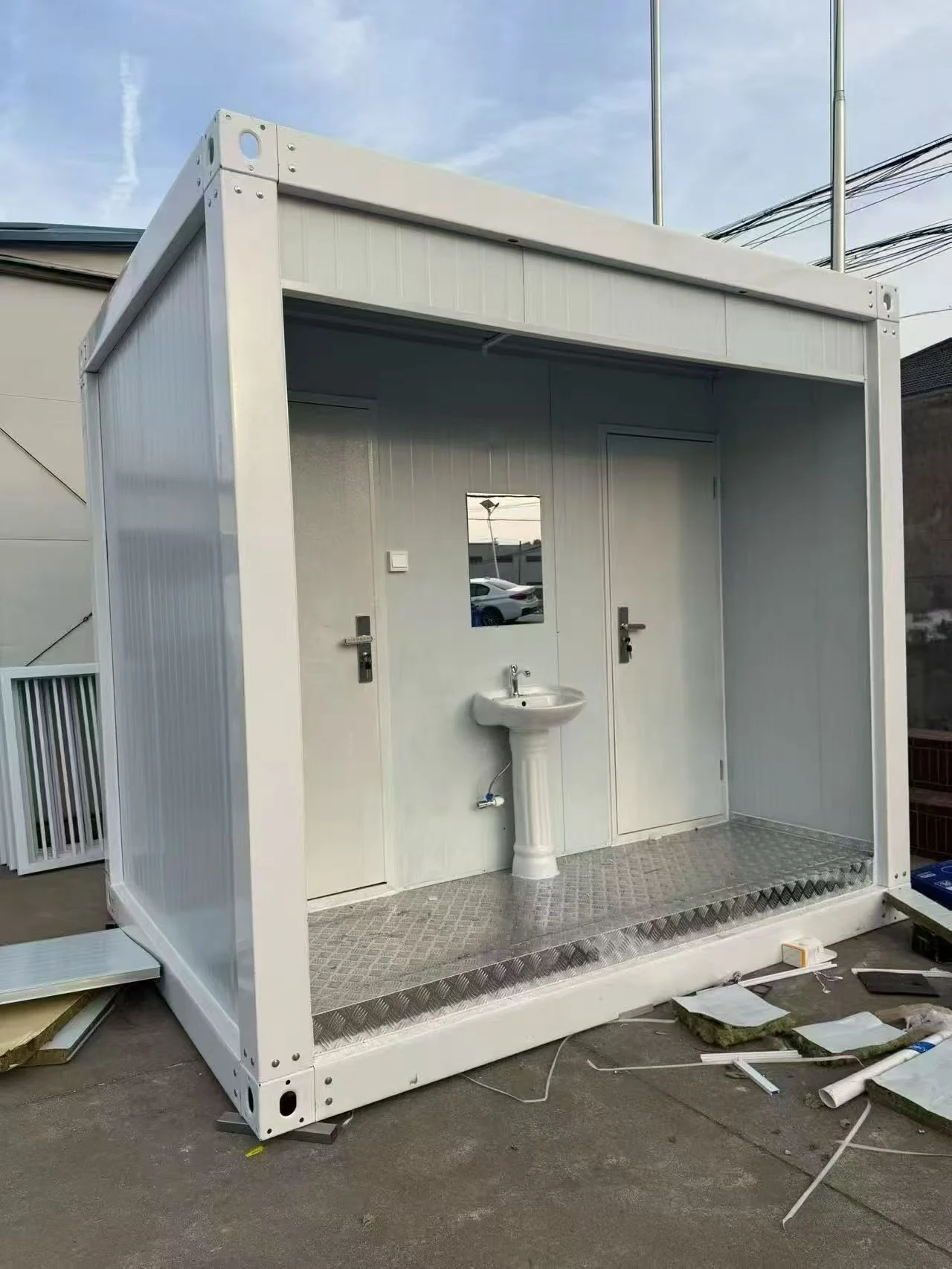 Quick assembly container house bathroom service module